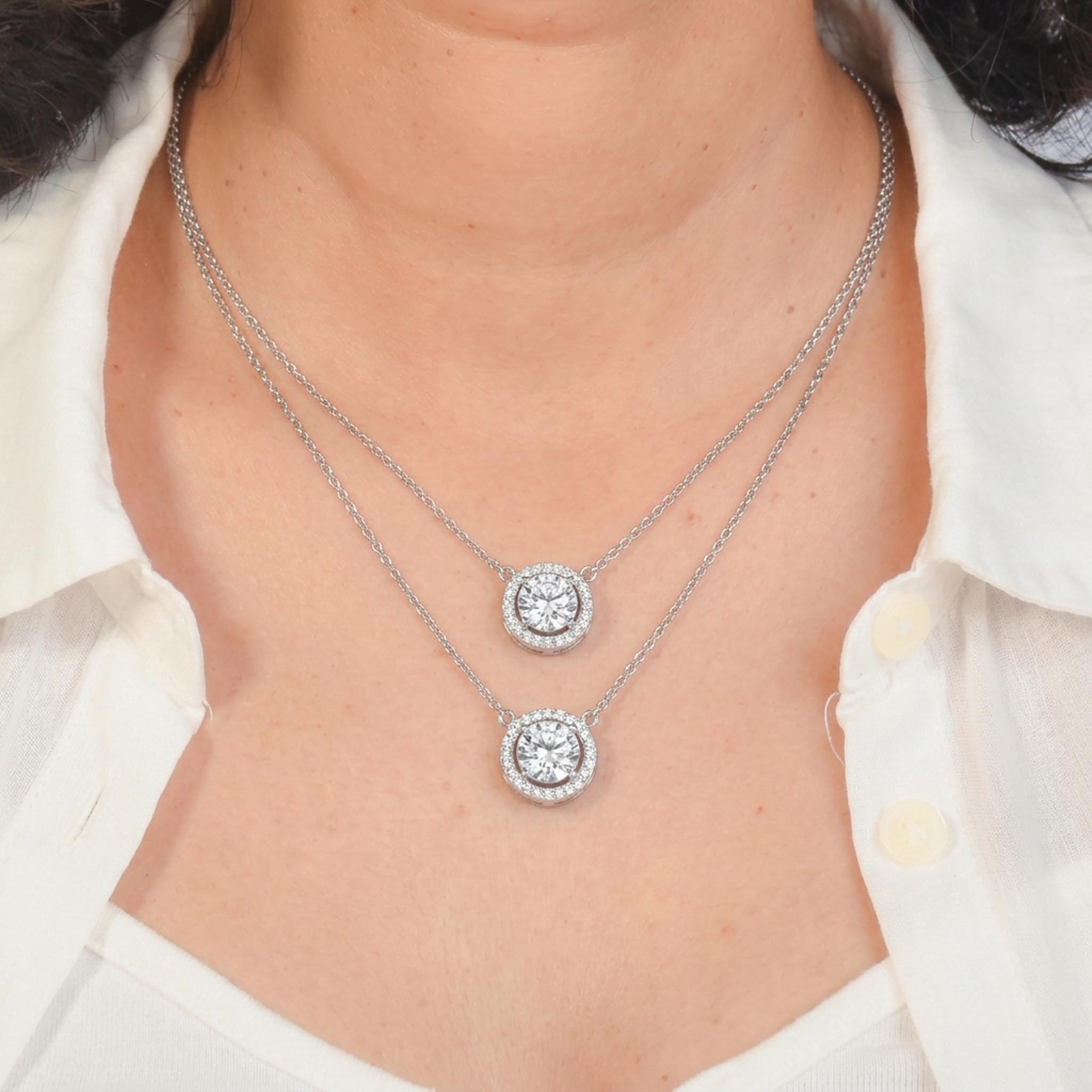 Layered Sparkle 925 sterling silver necklace featuring a double-layer chain design with two round crystal halo pendants.
