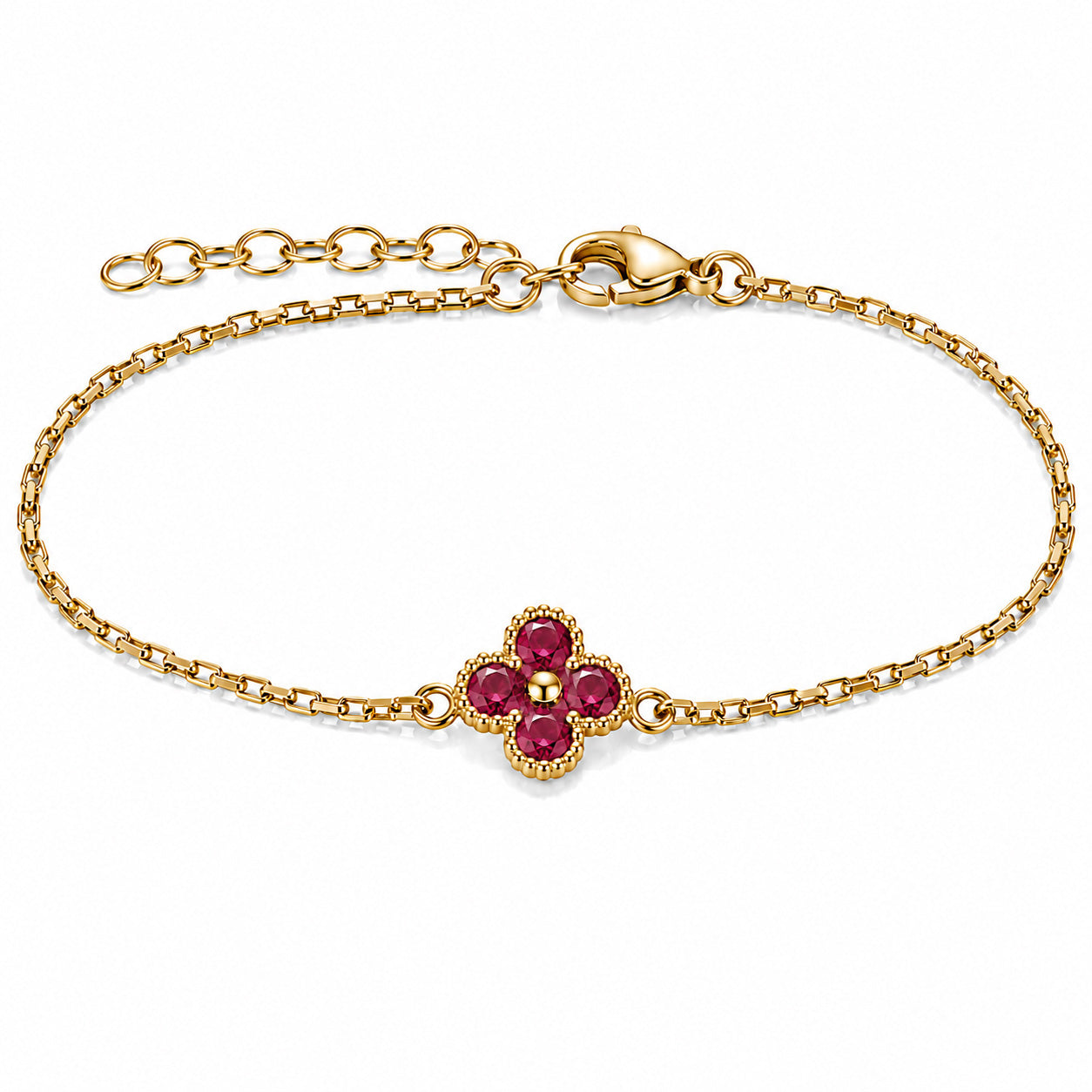Gold-tone bracelet featuring a deep pink four-petal flower charm with faceted stones, a delicate link chain, and an adjustable clasp on a white background.