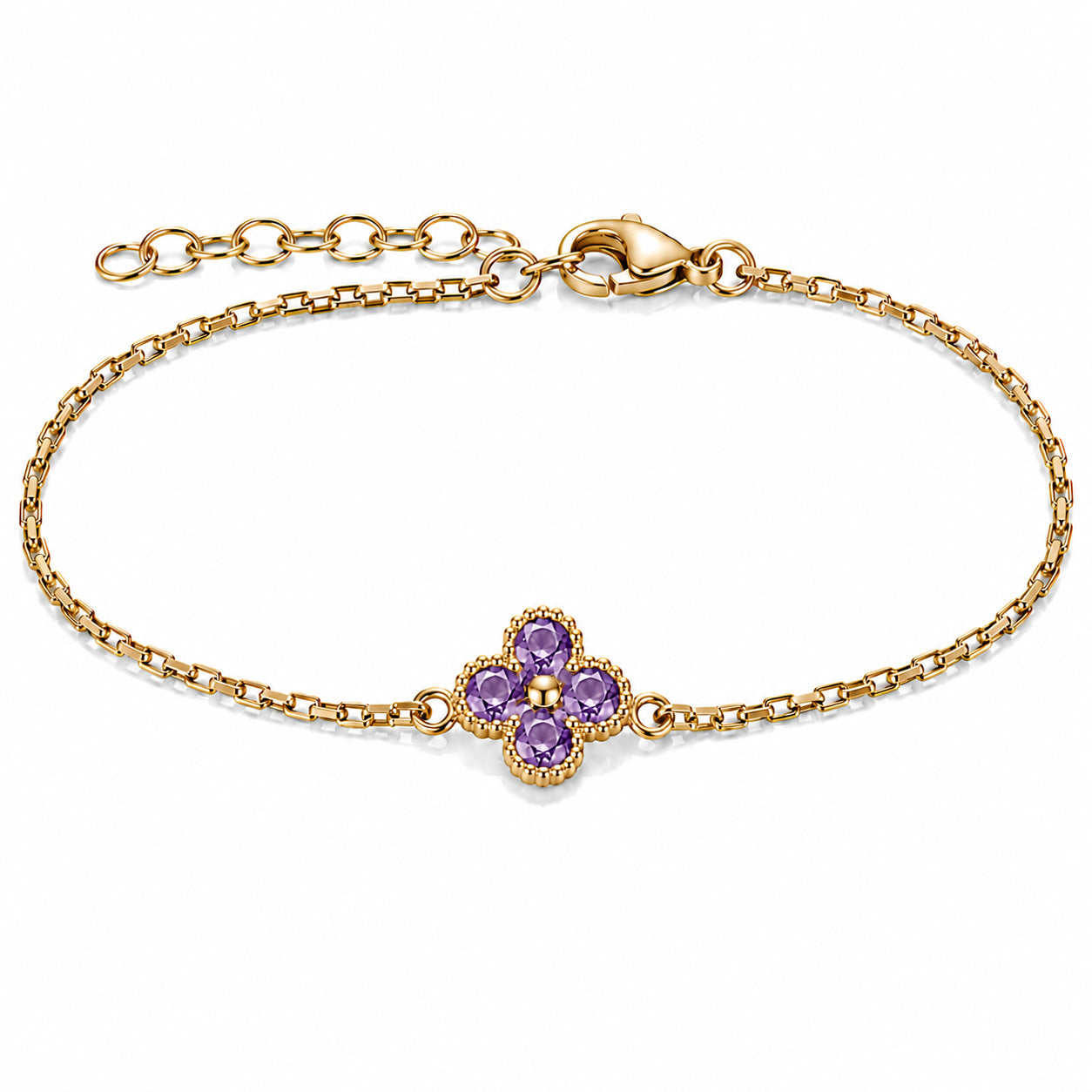 Gold-tone bracelet featuring a purple four-petal flower charm with faceted stones, a delicate link chain, and an adjustable clasp on a white background.