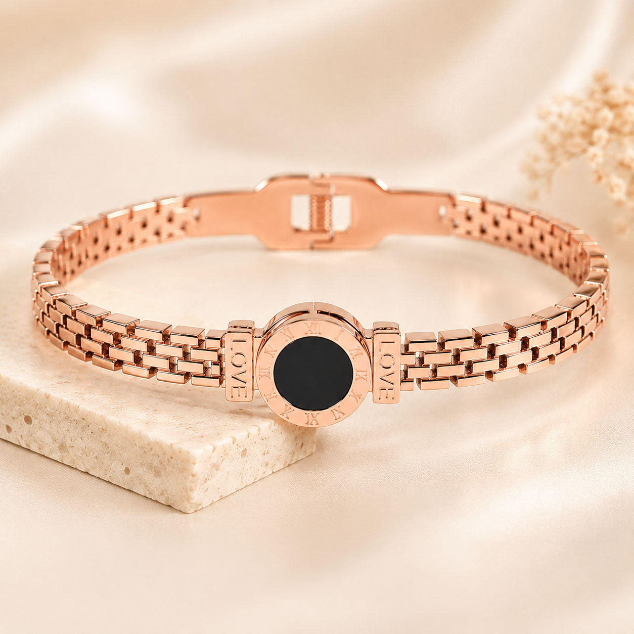 Elegant Roman-style bangle with black detailing and an anti-tarnish finish, available in golden and rosegold, perfect for everyday luxury and chic versatile styling.