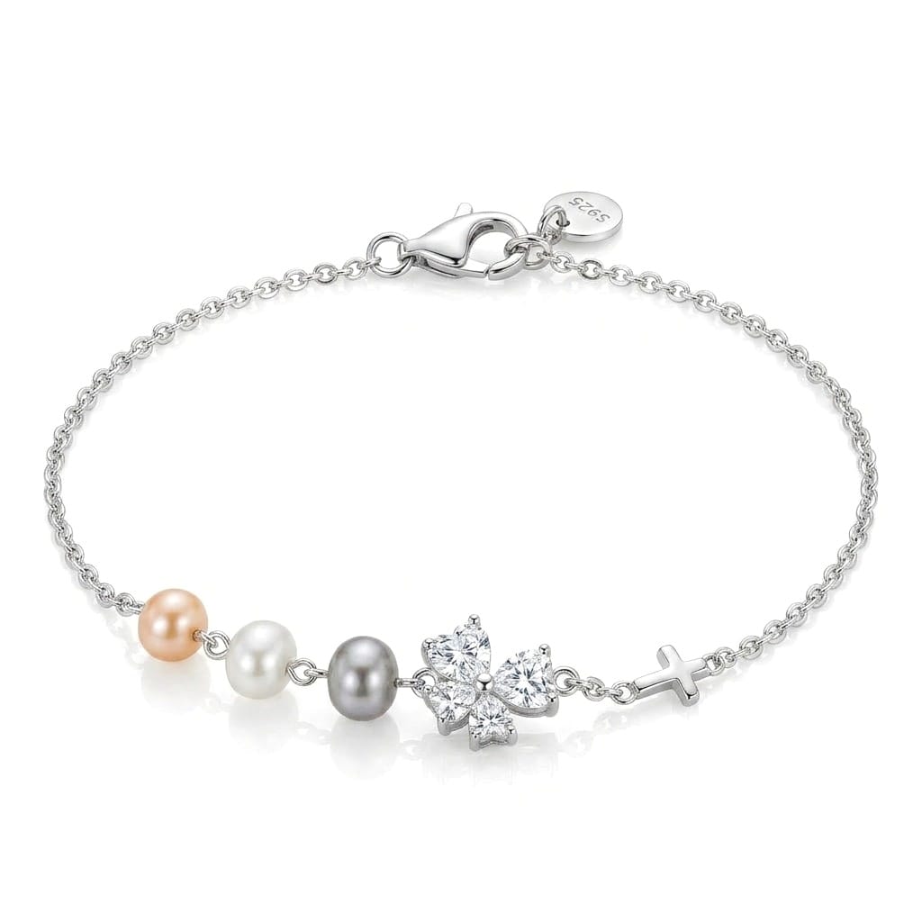 Butterfly Pearl 925 Sterling Silver Bracelet featuring a delicate sterling silver chain adorned with three lustrous pearls in peach, white, and grey hues, a sparkling butterfly-shaped cubic zirconia centerpiece, and a polished cross charm
