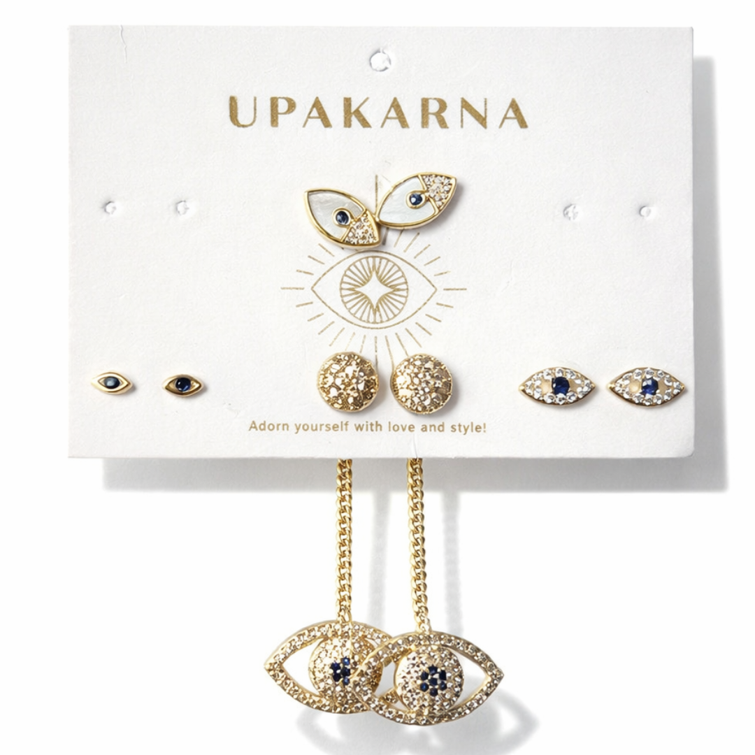 gold evil eye earring stack with dainty evil eye studs and celestial eye drop earrings lightweight stackable jewellery