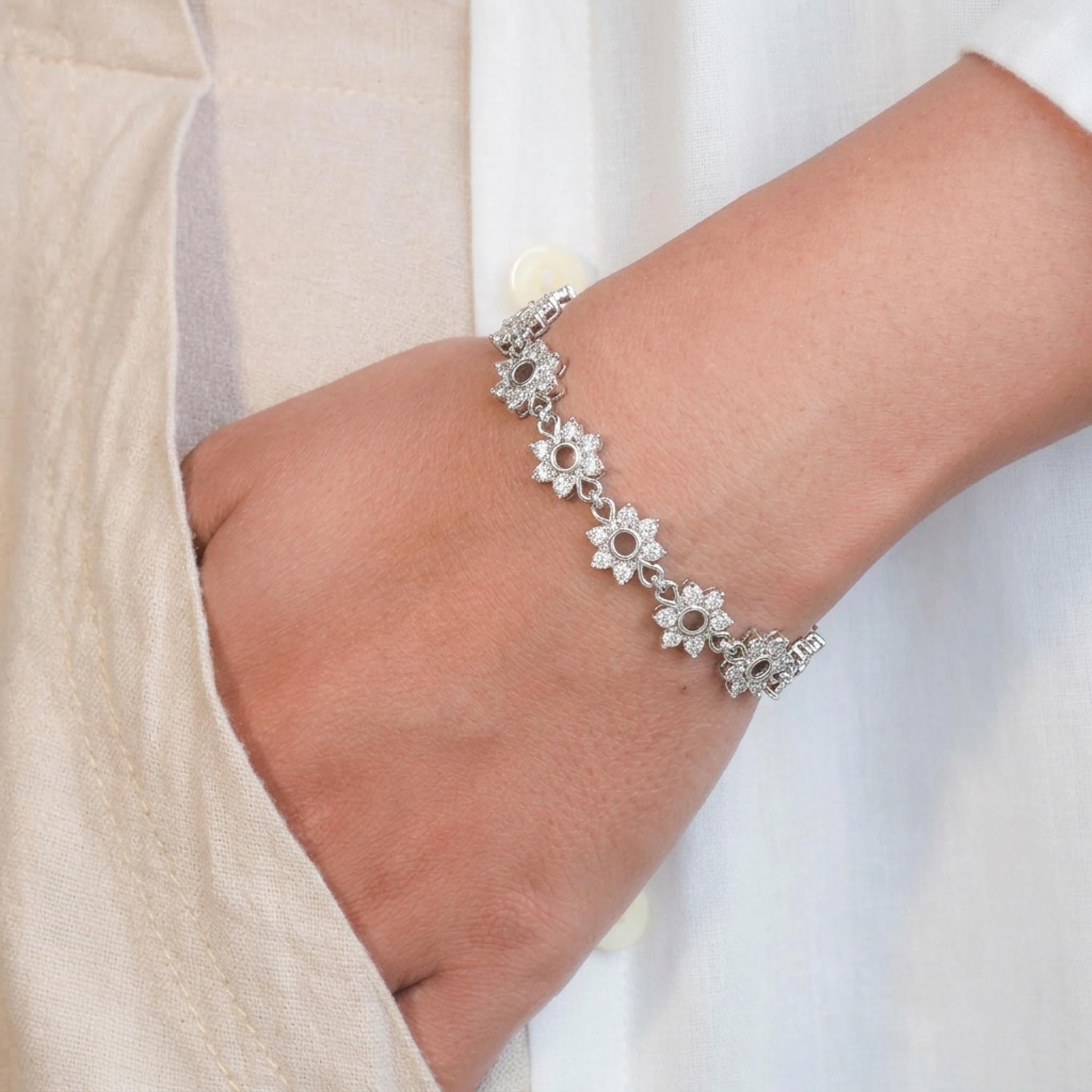 Celestial Flower 925 Sterling Silver Bracelet featuring a continuous row of floral-inspired links adorned with sparkling pave-set stones