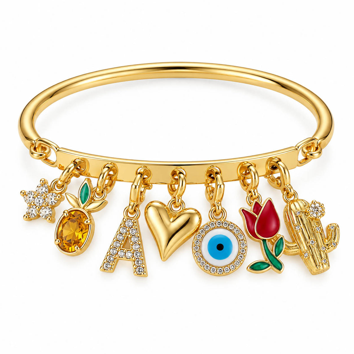 Gold-tone charm bracelet featuring a smooth cuff band with multiple dangling charms, including a crystal-studded flower, amber gemstone, letter “A,” heart, blue evil eye, red tulip, and cactus charm, displayed on a clean white background.