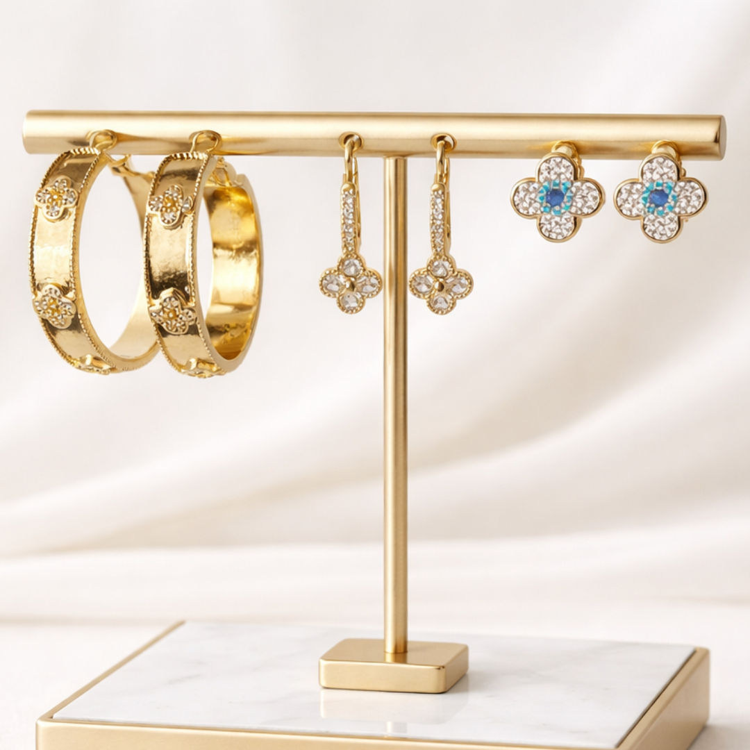 gold clover earring stack with crystal clover stud, clover sparkle hoops and gold crystal pave hoops lightweight stackable jewellery