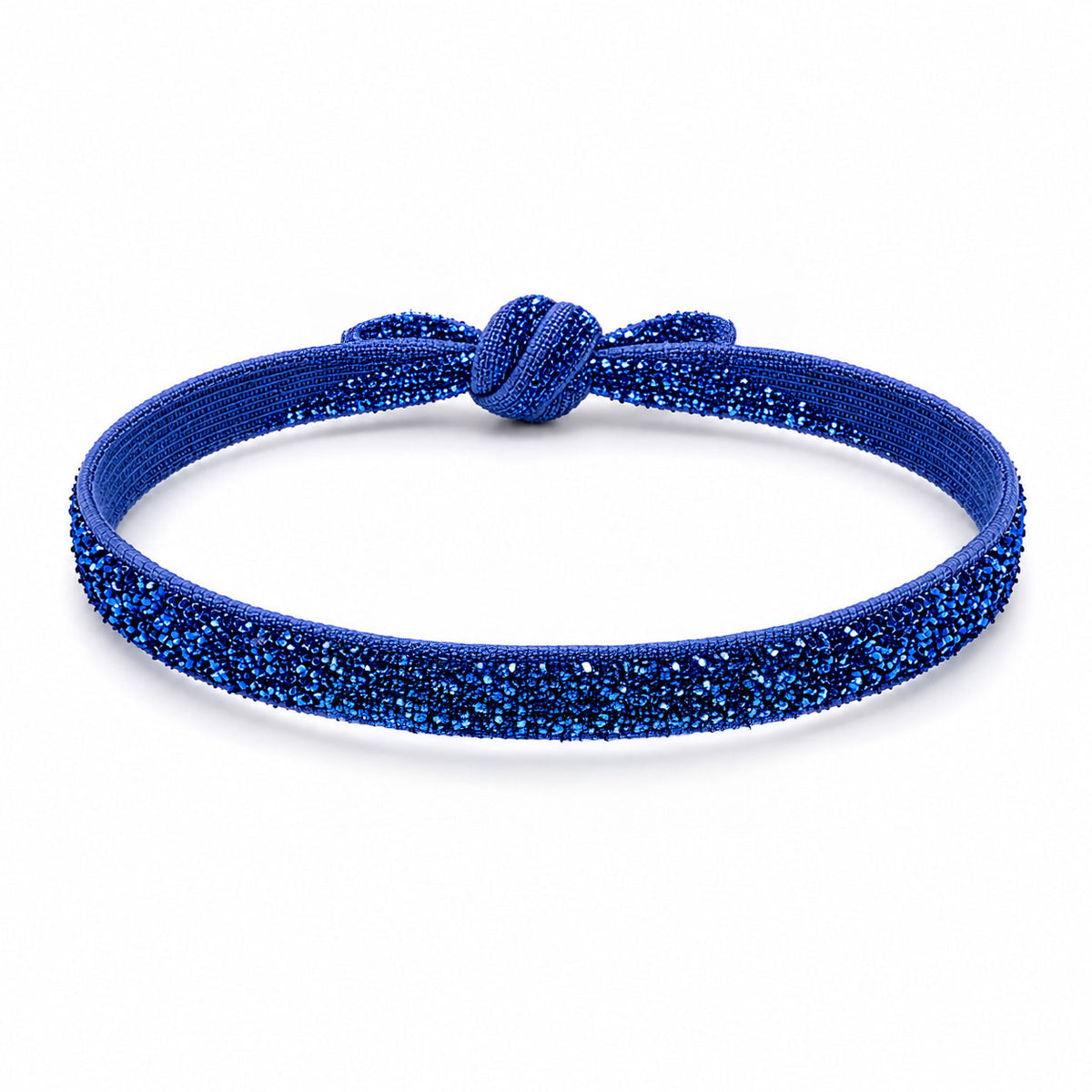 Blue glitter bracelet with a matching blue fabric knot, displayed on a clean white background.