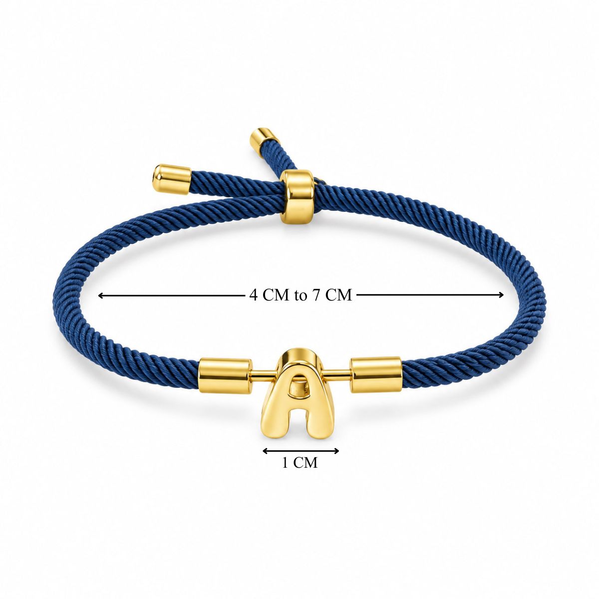 Navy blue braided cord bracelet with gold-tone end caps, an adjustable sliding clasp, and a centered gold-tone letter charm, shown with size measurements of 4–7 cm and a 1 cm charm width.