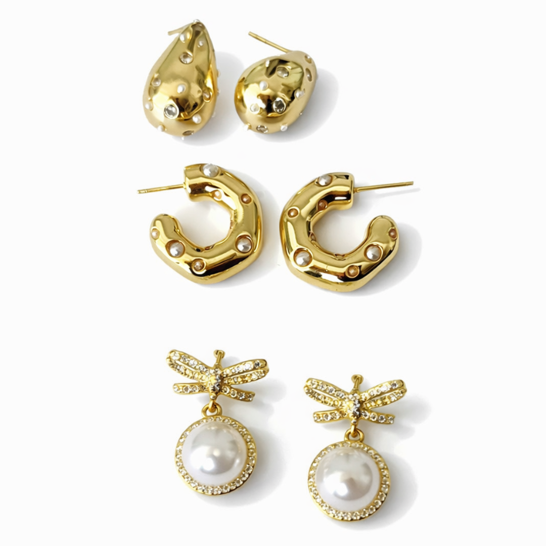 gold pearl earring stack with bow earrings, pearl hoops and tear drop earrings elegant lightweight jewellery