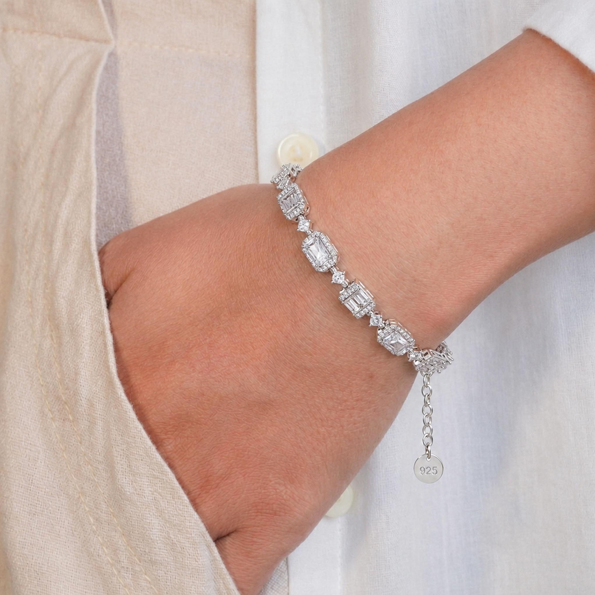 Diamond Pavilion 925 Sterling Silver Bracelet featuring emerald-cut and halo-set cubic zirconia stones in a geometric tennis bracelet design