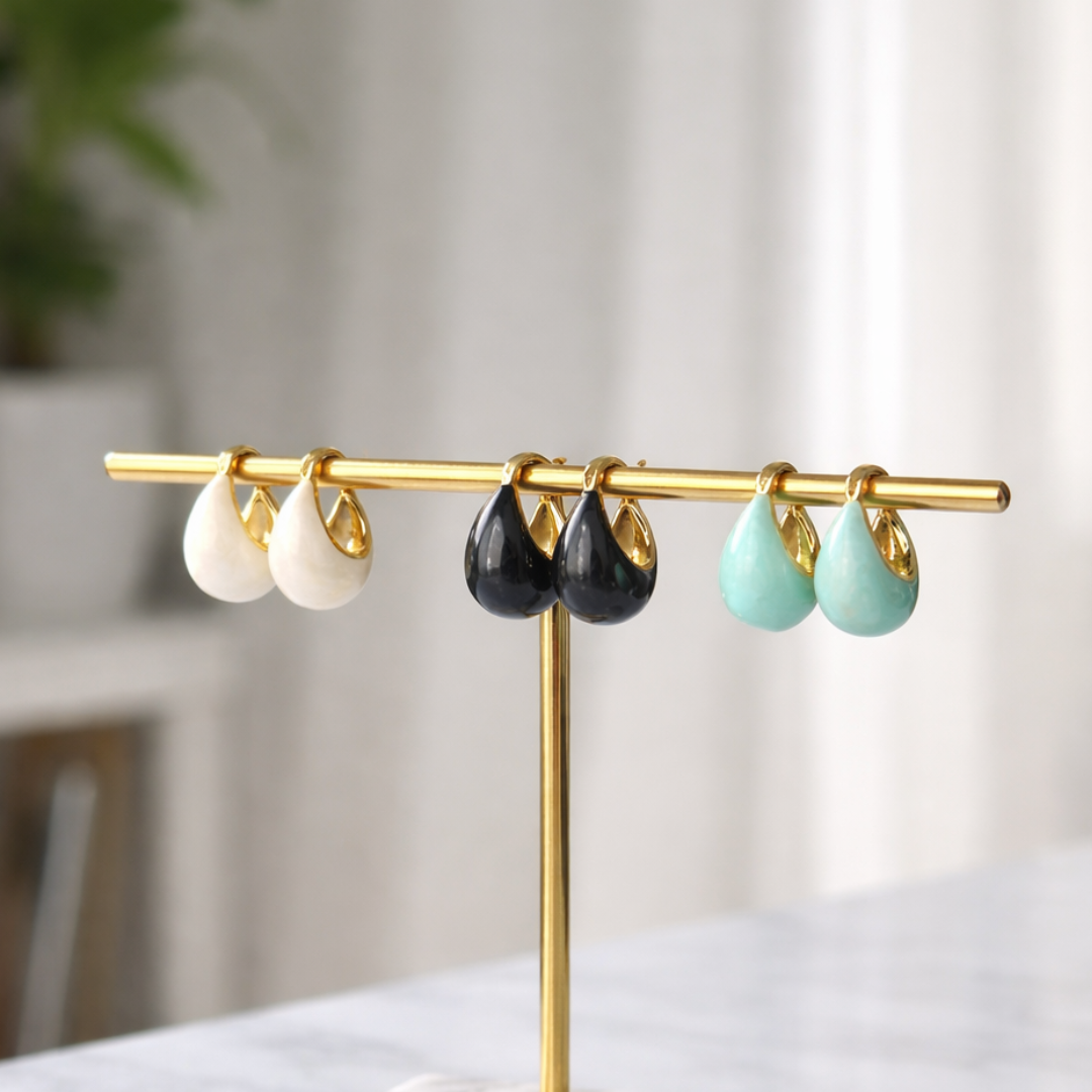 gold pastel earring stack with turquoise blue, pink and black enamel earrings lightweight trendy jewellery