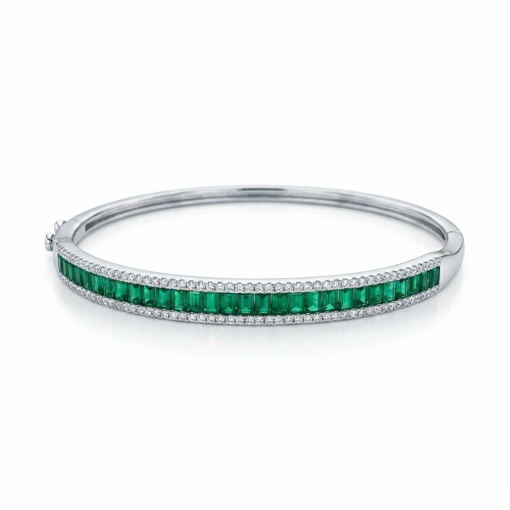 Emerald Cascade 925 Sterling Silver Bangle with emerald-green baguette stones, shimmering cubic zirconia borders