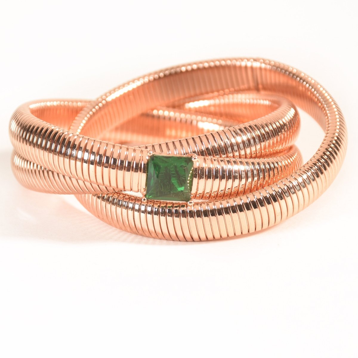 Elegant triple-layer bangles with vibrant emerald stone detailing and an anti-tarnish finish, perfect for party wear, casual elegance, and royal-inspired styling.