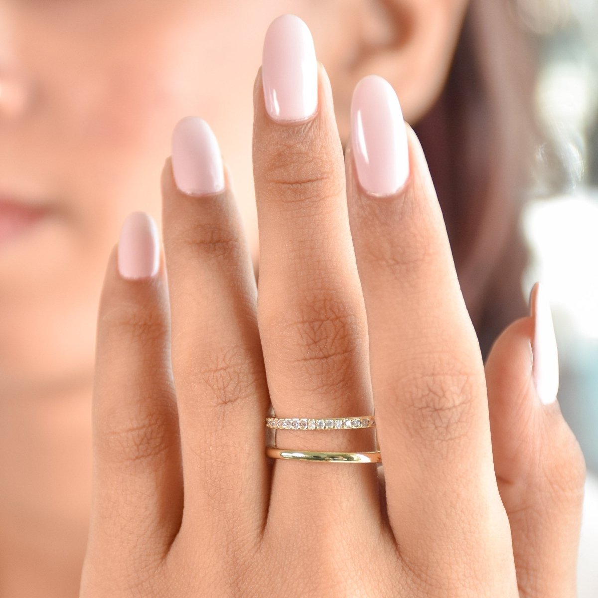 Elegant golden band ring with a sleek polished finish, subtle sparkle, and adjustable anti-tarnish design, perfect for everyday wear, effortless stacking, casual outings, parties, and adding a touch of glam to any look.