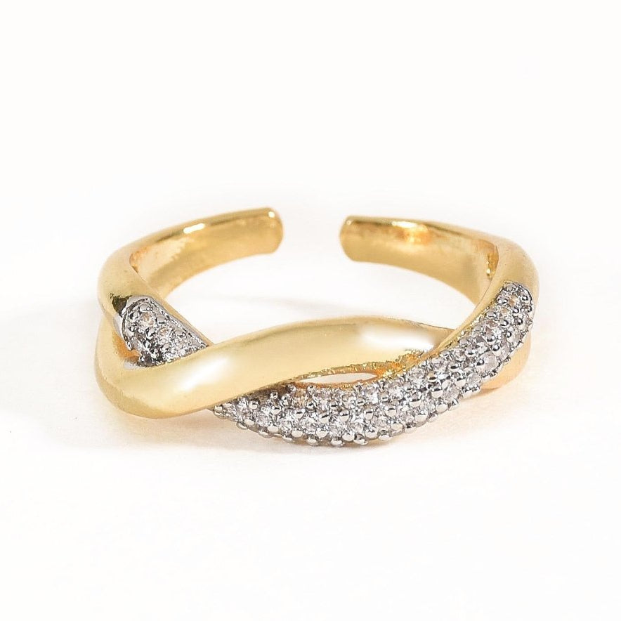 Elegant golden weave ring with intertwined polished bands, sparkling crystal detailing, and an adjustable anti-tarnish finish, perfect for everyday elegance and sophisticated styling.