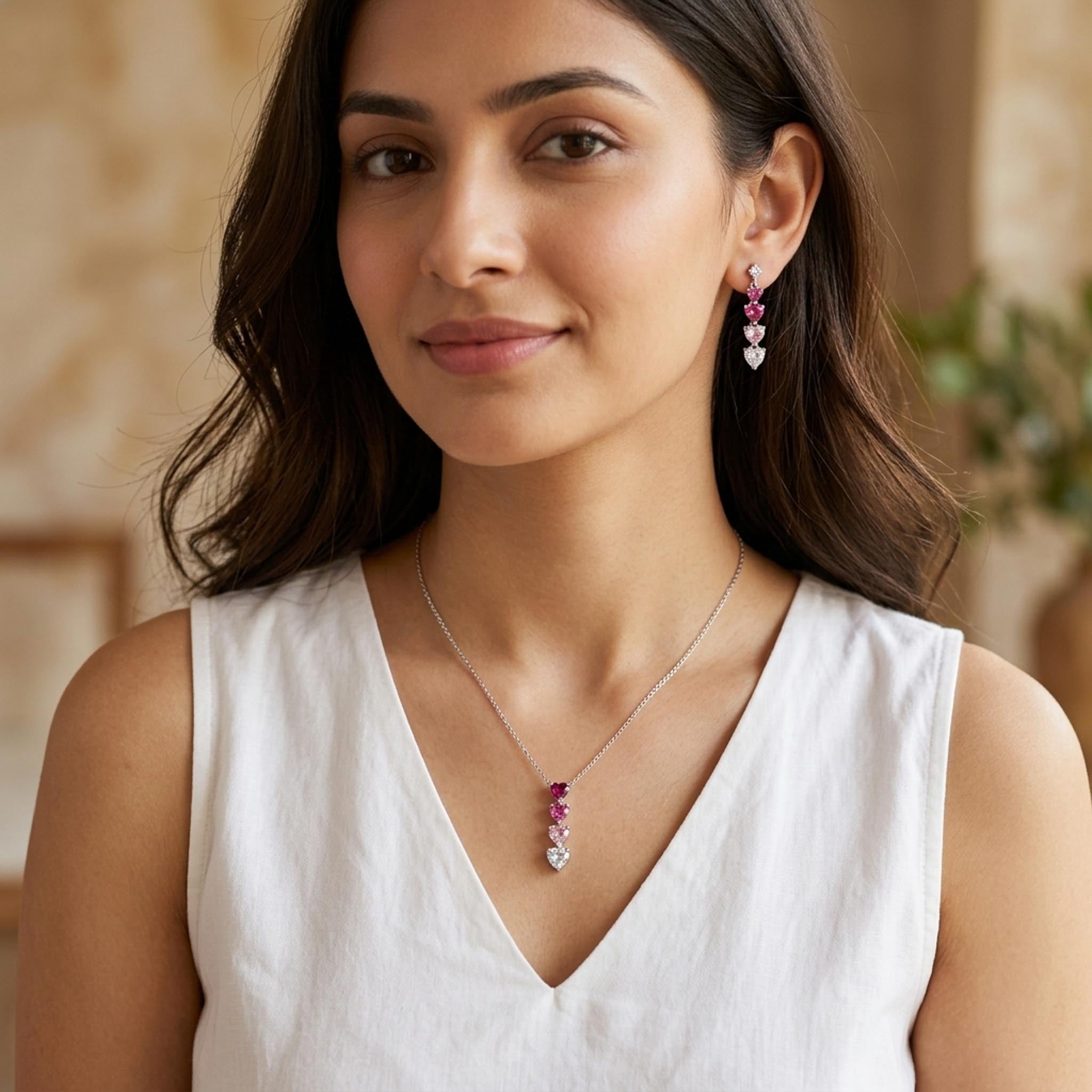 Heart Cascade 925 Sterling Silver Jewelry Set featuring a necklace and matching earrings with sparkling heart-shaped pink and clear crystals in a cascading design