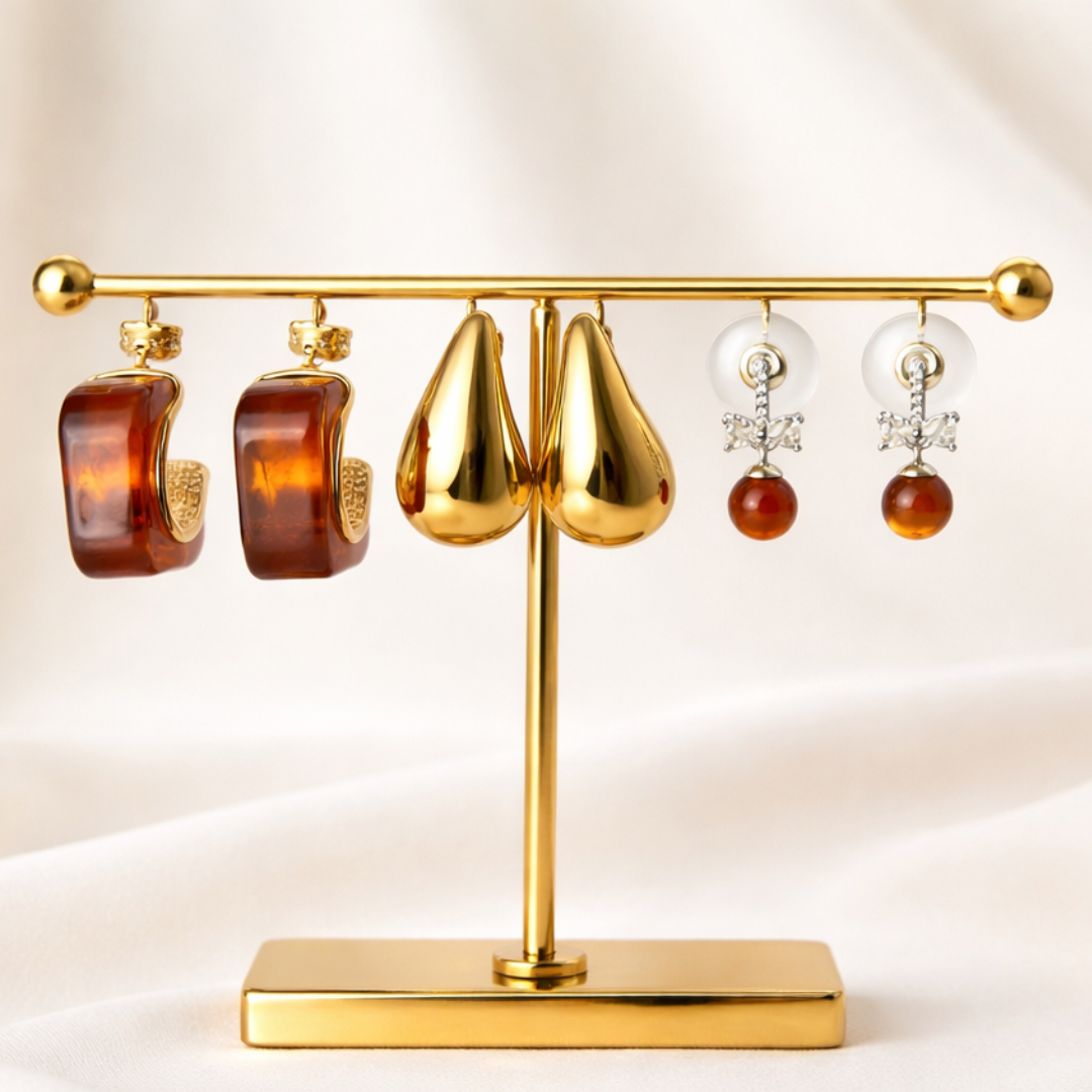 gold and amber earring stack with sunstone square hoops, persimmon drop earrings and tear drop earrings lightweight jewellery