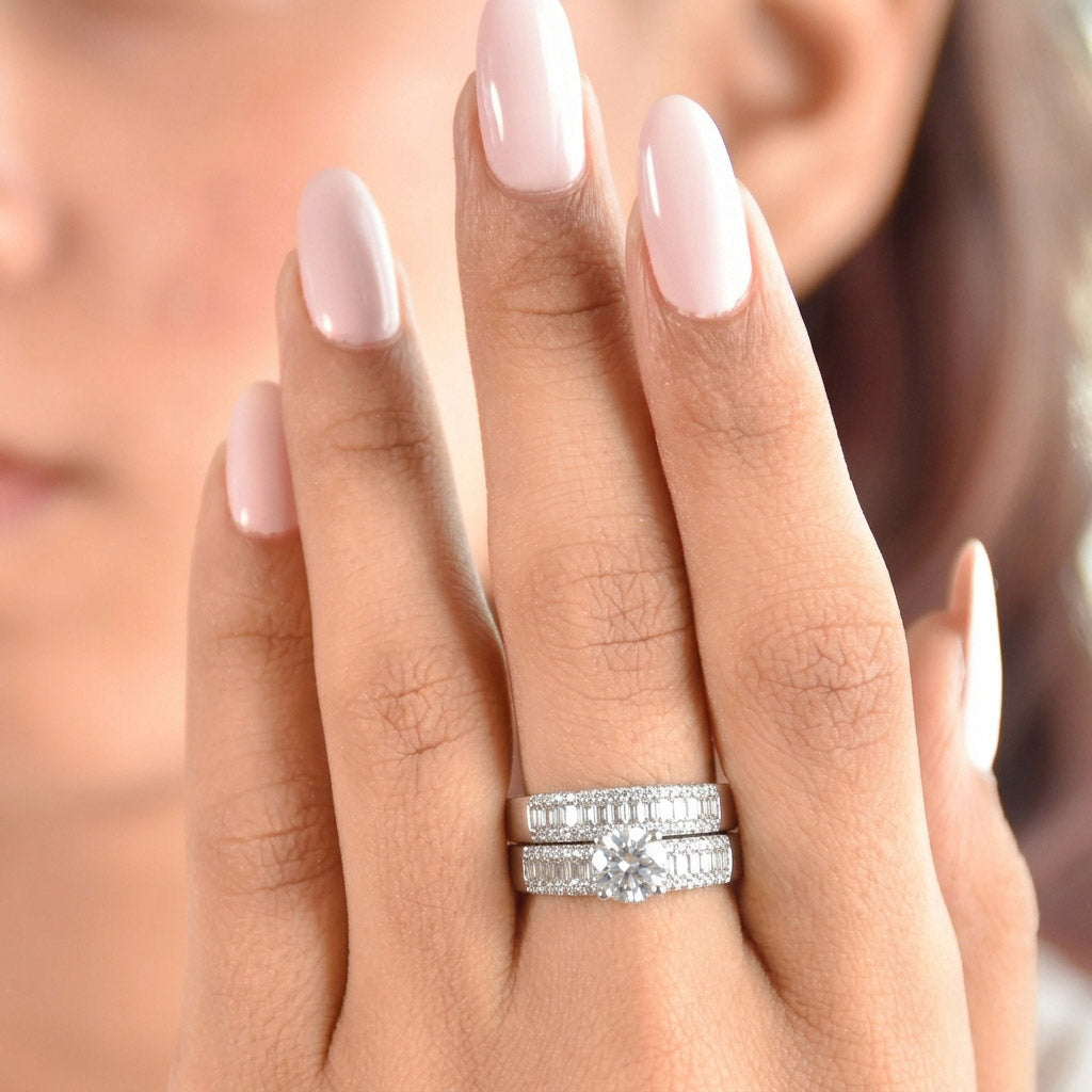 Imperial Sparkle Ring with a round-cut center stone, baguette accents, and pavé band for bold, luxurious brilliance.