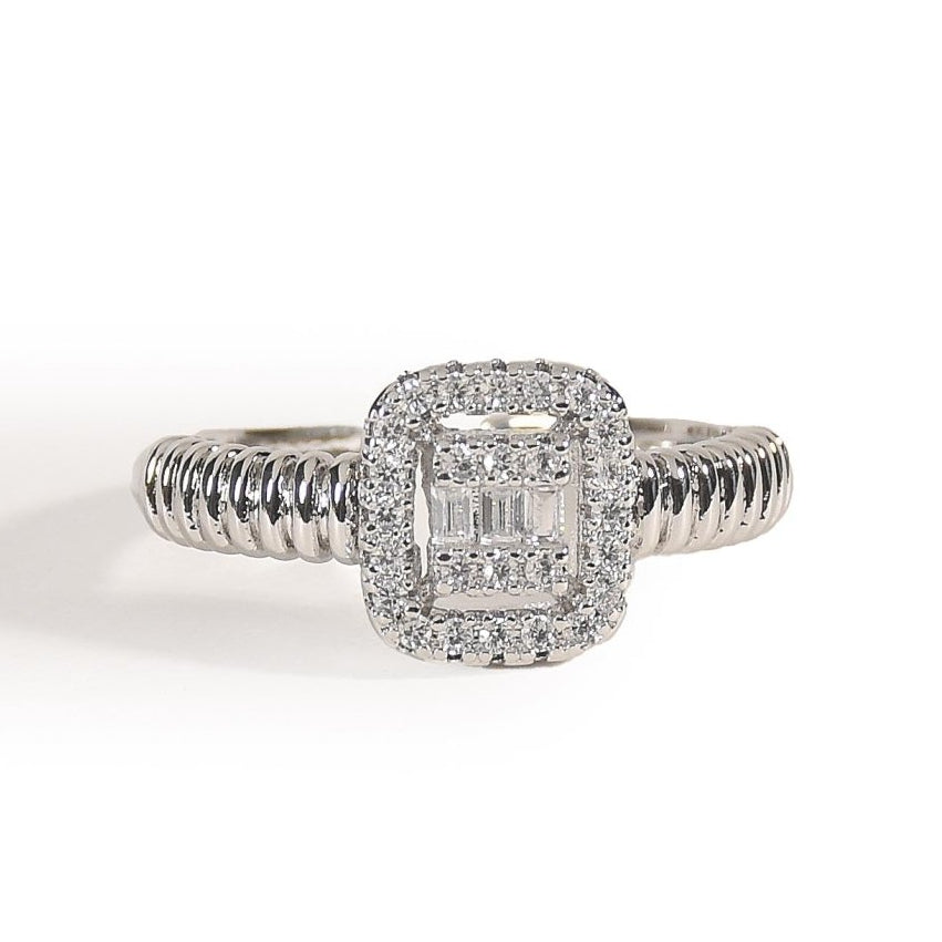 Luxurious silver statement ring featuring a sparkling square crystal centerpiece, ribbed detailing, and anti-tarnish finish, perfect for elegant occasions, evening wear, and bold sophisticated styling.