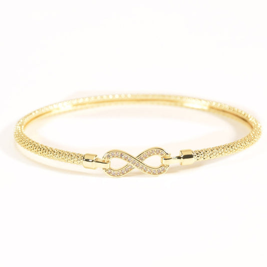 Infinity bangle with a sleek infinity motif and anti-tarnish finish, available in gold, rose gold, and silver, perfect for everyday wear, meaningful gifting, and timeless styling.