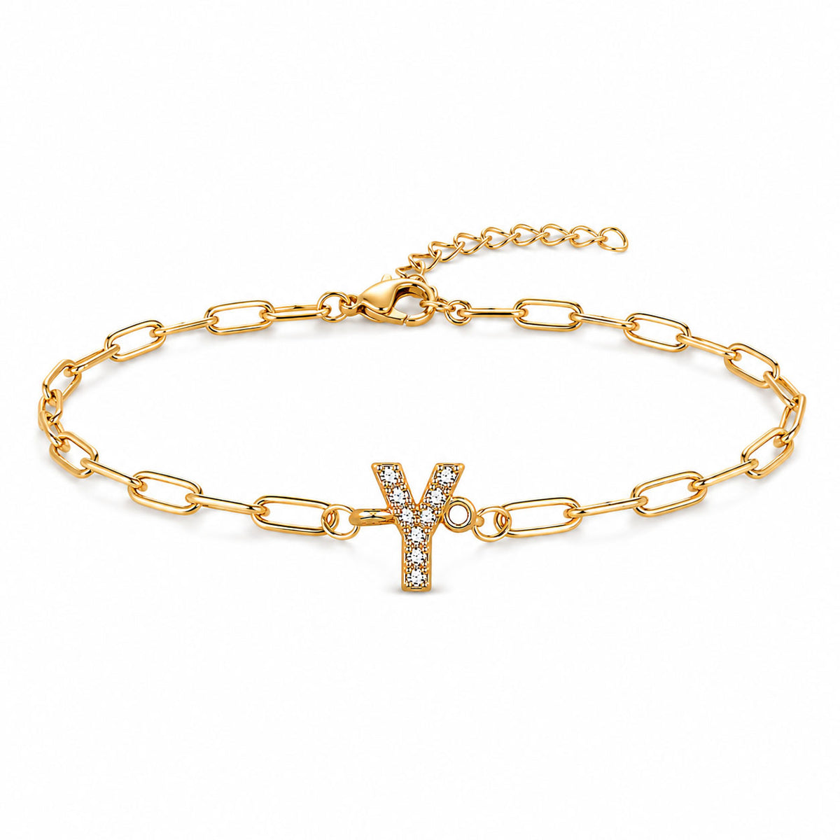 Gold-tone chain bracelet with elongated oval links, a sparkling letter “Y” charm, lobster clasp, and adjustable extender chain, displayed on a clean white background.