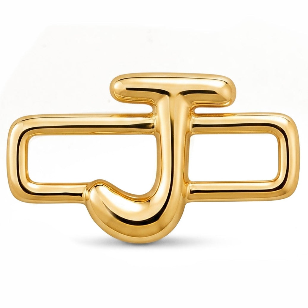 A polished gold-tone letter “J” charm with a glossy, reflective finish, featuring a bold uppercase A design integrated with a rectangular open-link frame. The charm has smooth rounded edges, a modern minimalist style, and a bright metallic surface, displayed against a clean white background.