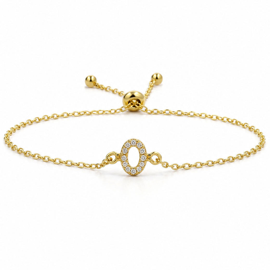 Gold chain lucky number 0 crystal bracelet with an adjustable slider clasp on a white background.