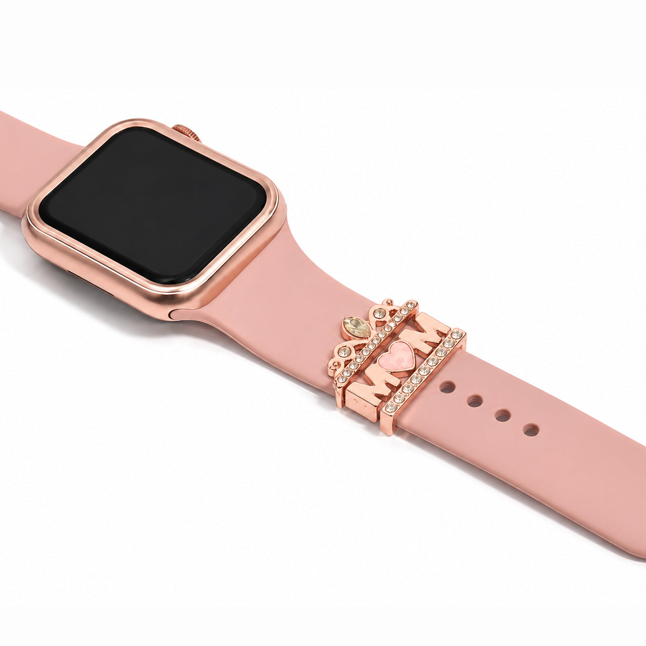 Zoomed out view of a rose gold smartwatch strap decorated with sparkling crystal bars, heart, gemstone charms on a white background.