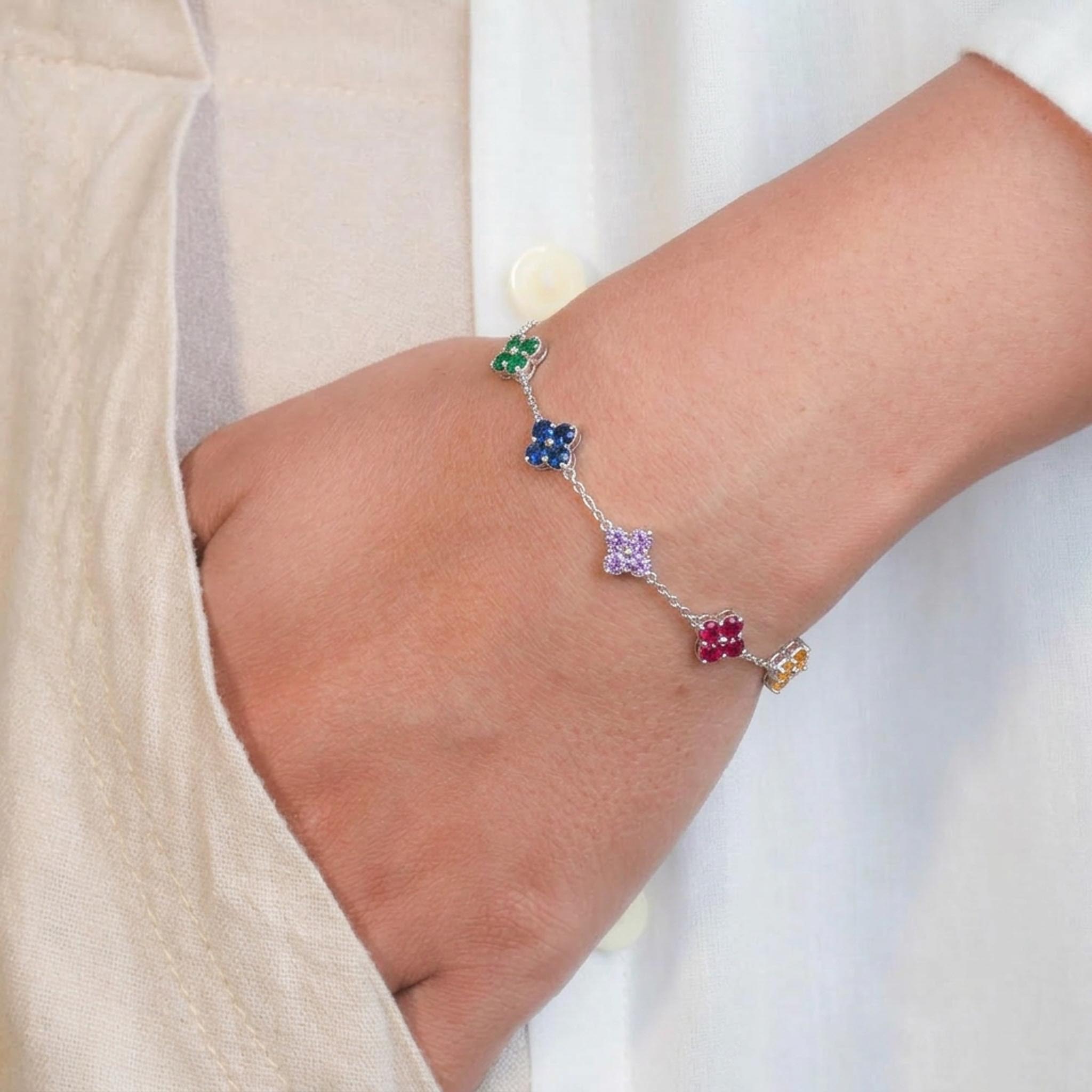 Multicolor Clover 925 Sterling Silver Bracelet featuring vibrant clover-shaped gemstone motifs in green, blue, purple, pink, and yellow, elegantly linked on a delicate sterling silver chain