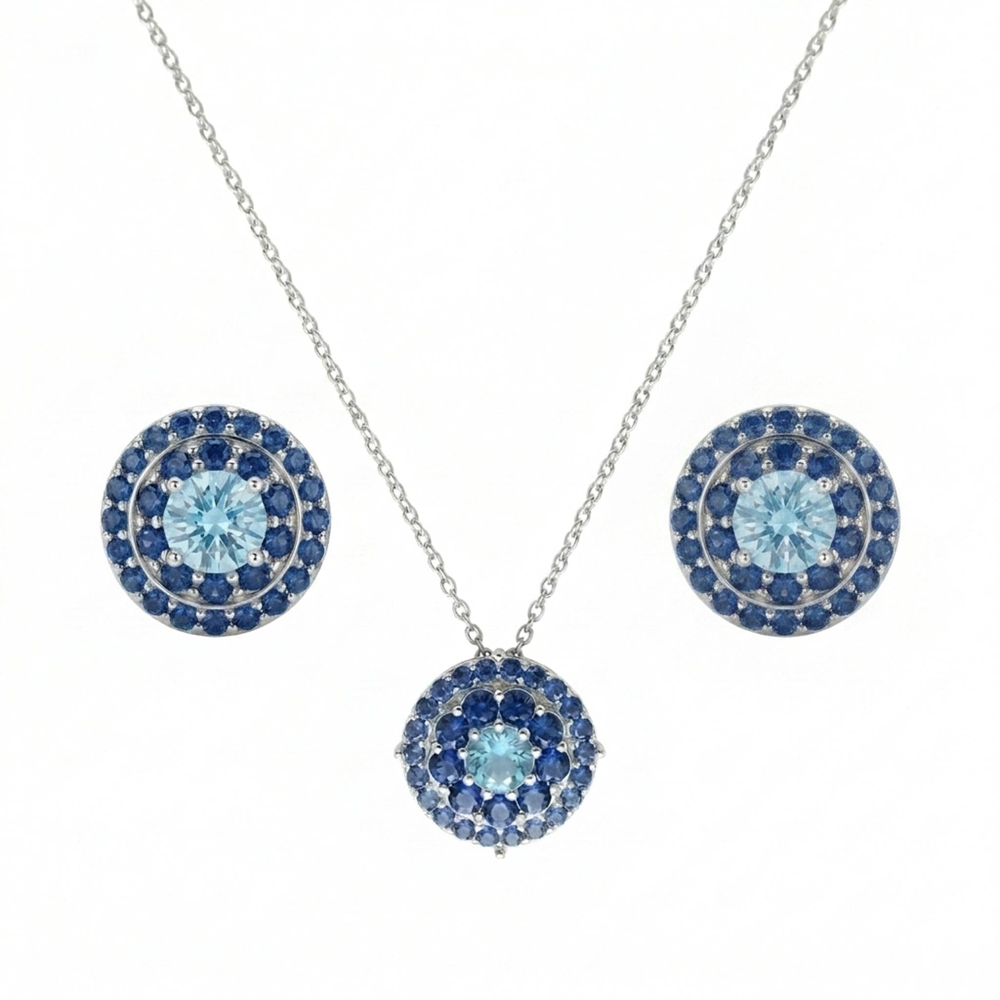 Mystic Evil Eye 925 Sterling Silver Necklace Set featuring a blue evil eye-inspired pendant necklace with concentric sapphire-blue and aqua stones, paired with matching stud earrings