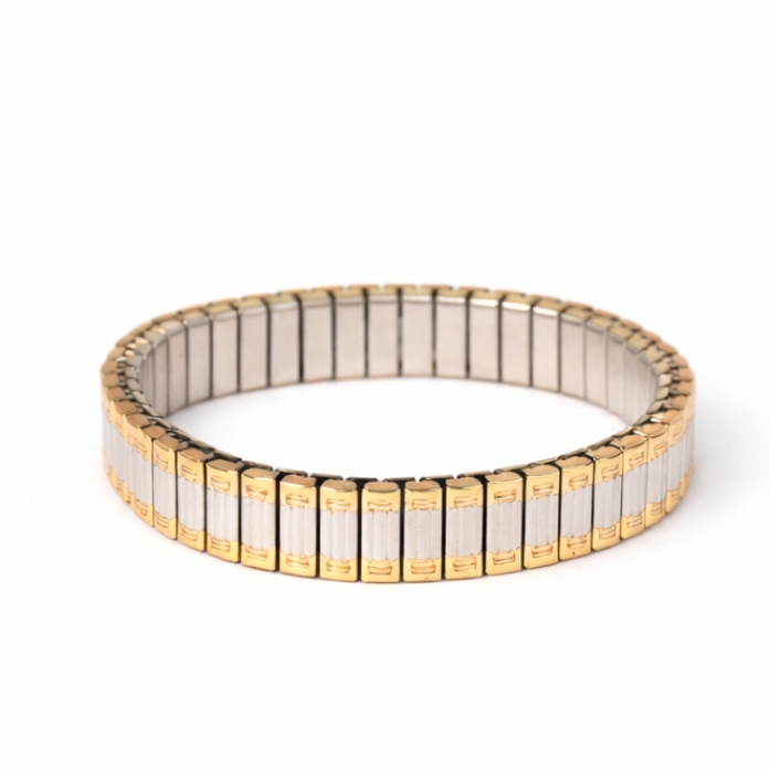 Bracelet with gold and white design on a white background
