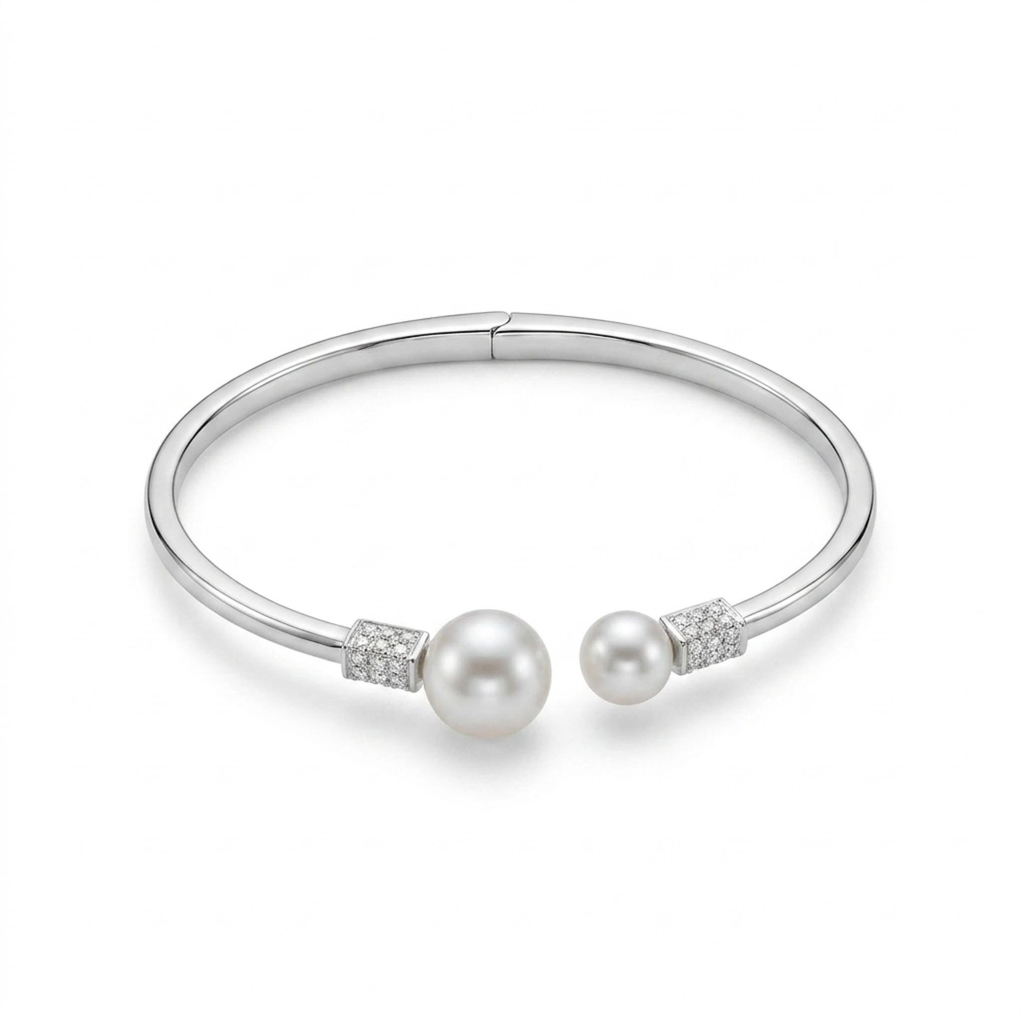 Pearl Aura 925 Sterling Silver Bangle with dual white pearls, cubic zirconia accents, and a sleek open-cuff sterling silver design
