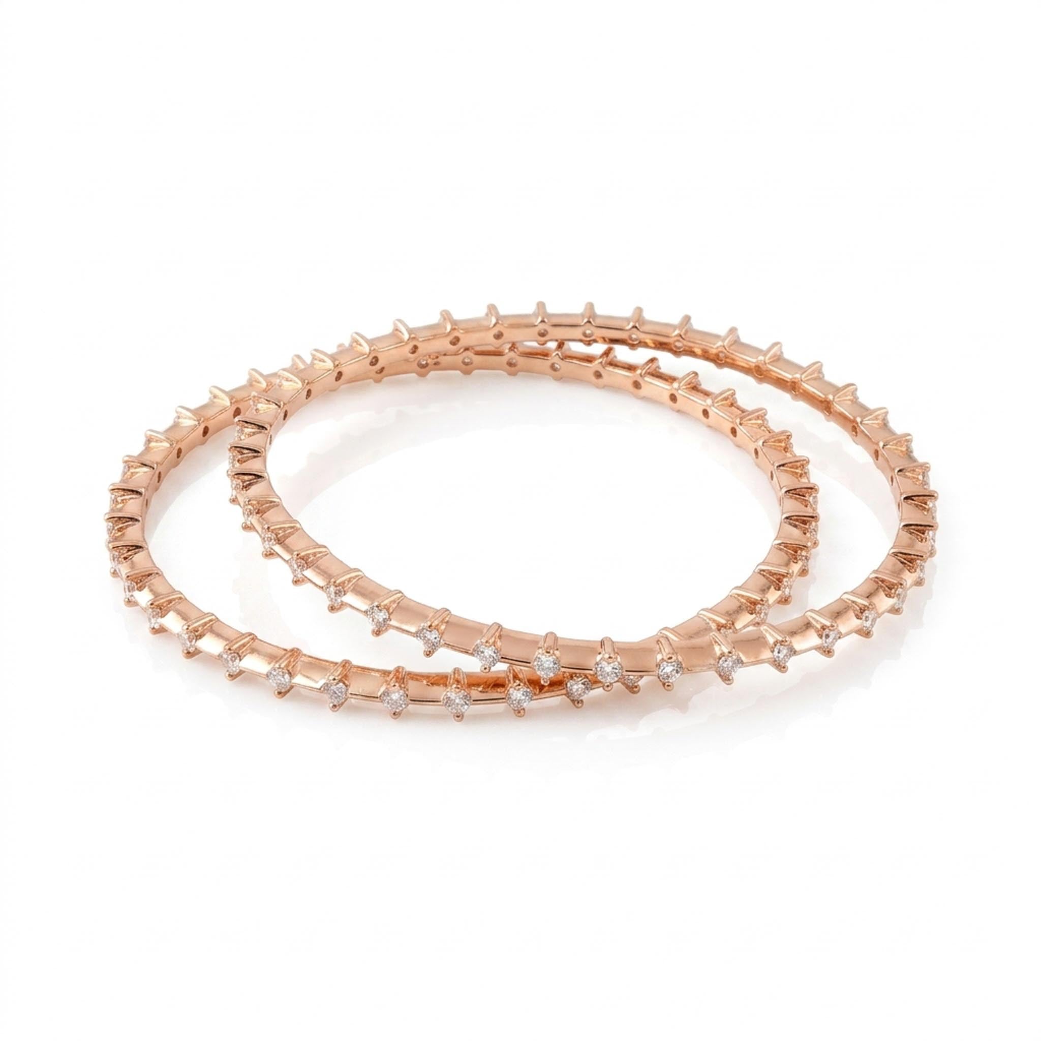 Rose gold sparkle bangles set with crystal detailing in a sleek, elegant design, perfect for everyday wear and festive styling