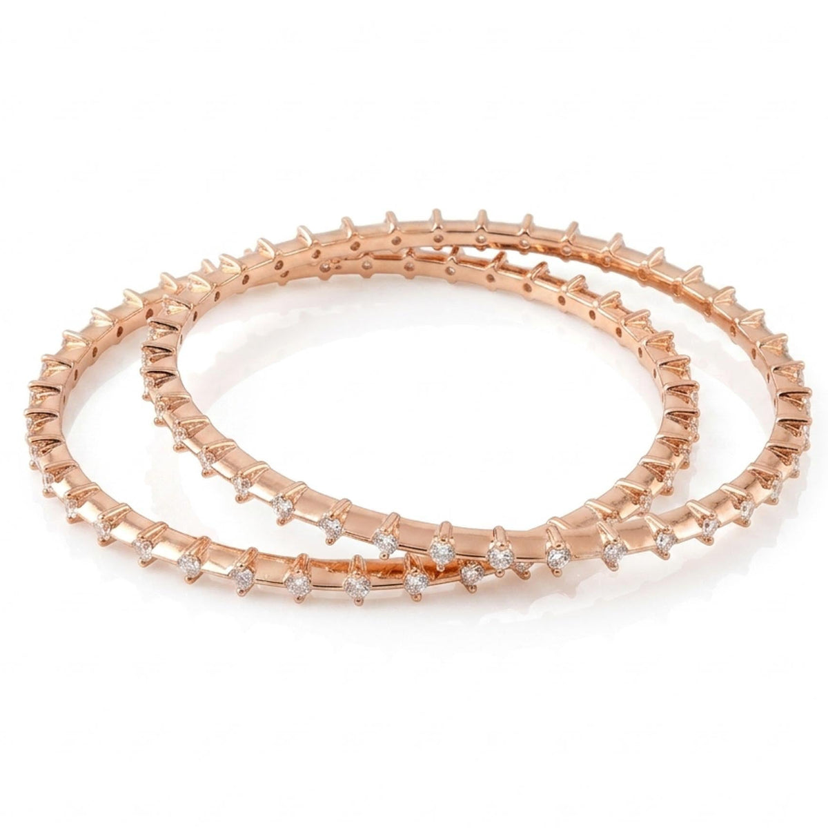 Rose gold sparkle bangles set with crystal detailing in a sleek, elegant design, perfect for everyday wear and festive styling