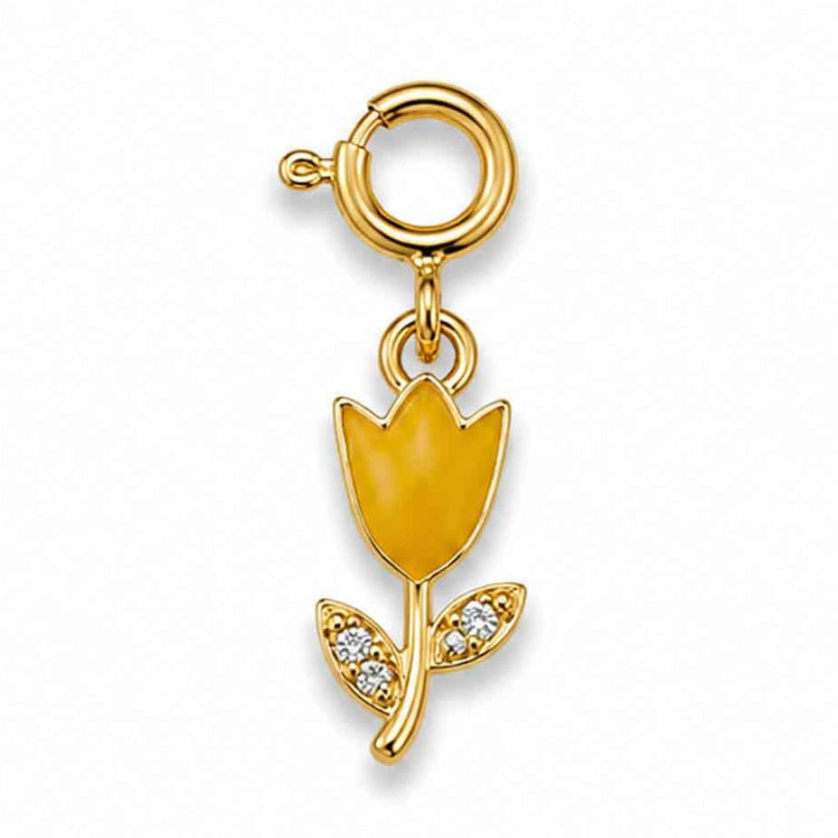 Gold-tone tulip charm featuring a yellow flower, crystal-studded leaves, and a circular clasp on a white background.