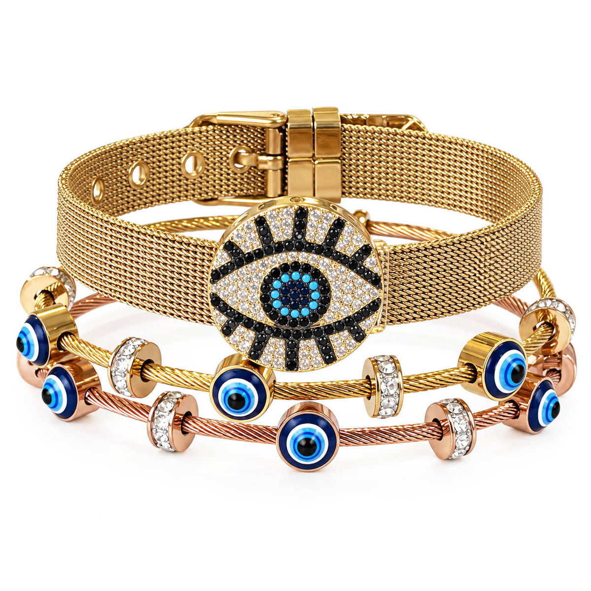 A product photo of a stacked set of gold and rose gold-tone bracelets featuring a mesh watch-style band with a large circular evil eye charm, paired with twisted cable wire bands decorated with blue-and-white evil eye beads and crystal ring spacers.