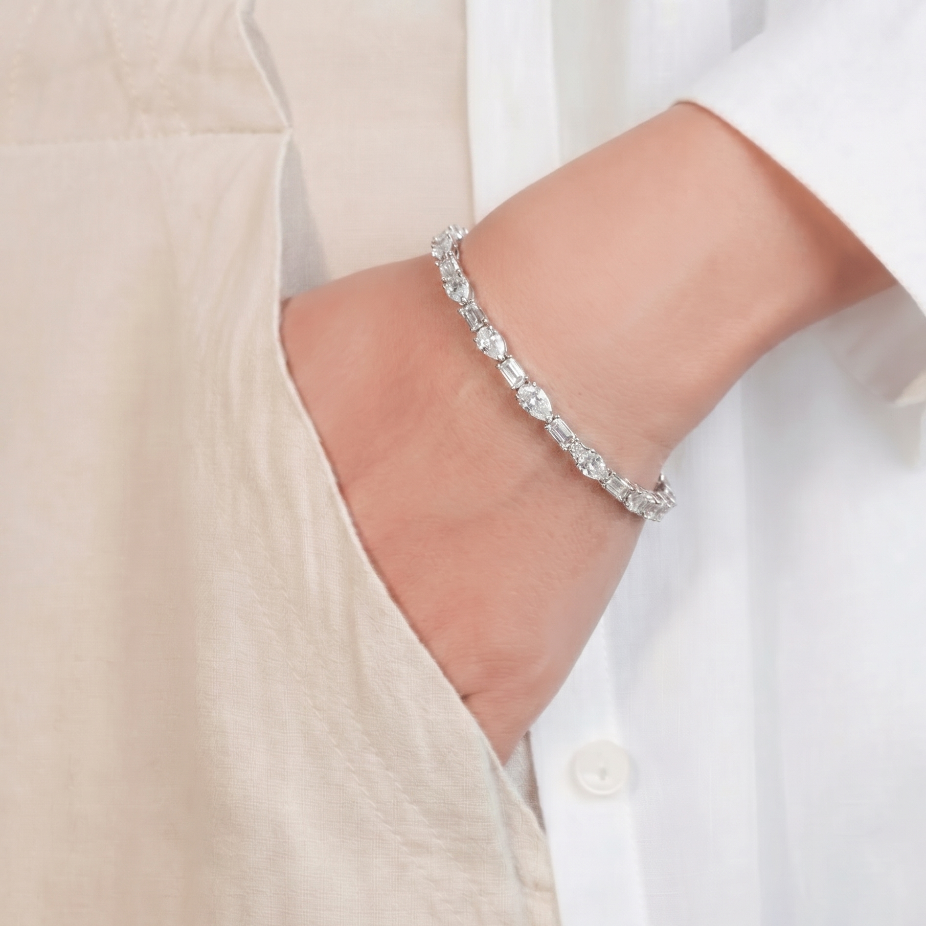 Signature Pear tennis bracelet with pear cut stones and sleek design. Perfect for stacking, everyday wear, and occasion styling.