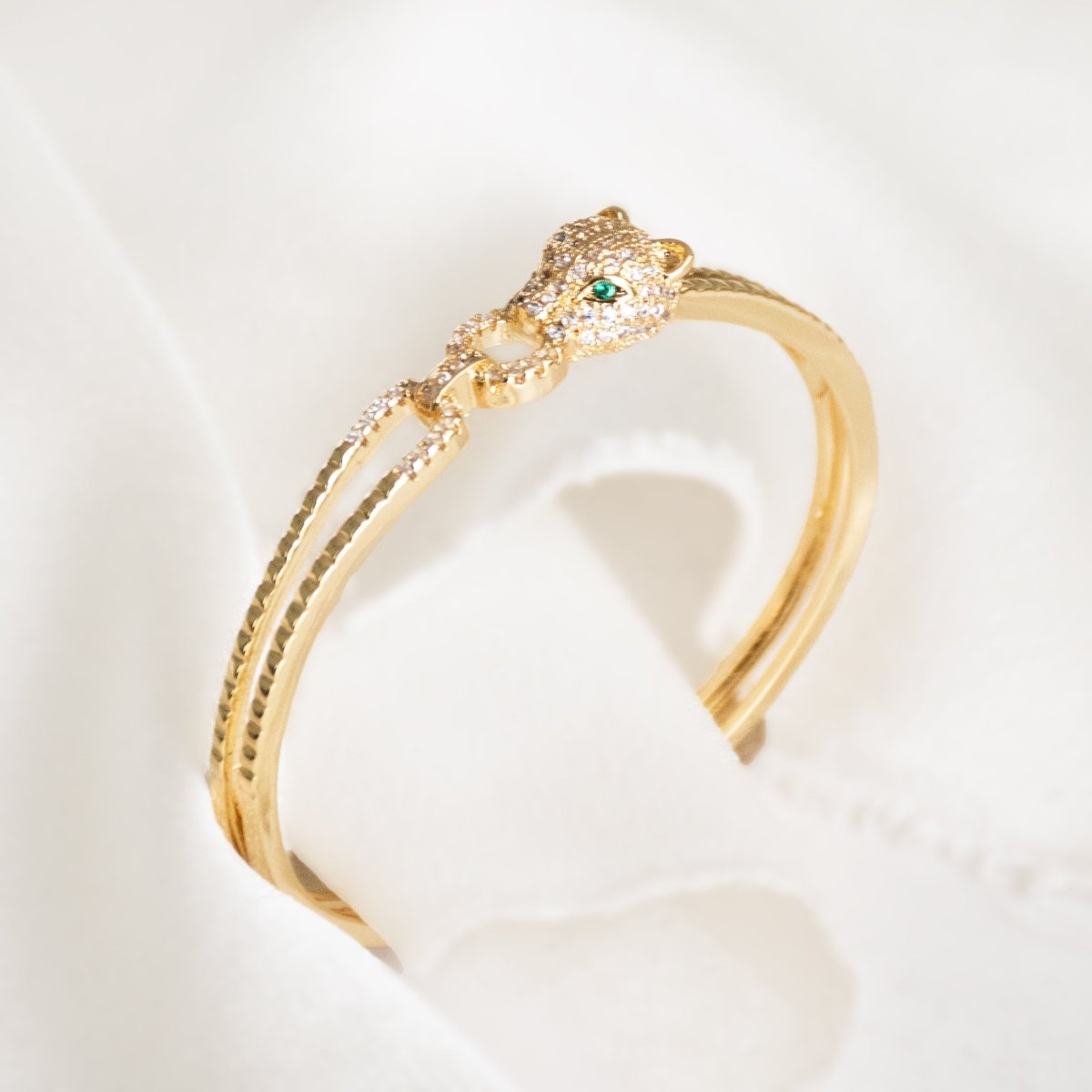 Trendy golden cheetah cuff bangle with a sleek adjustable design and anti-tarnish finish, perfect for everyday styling, statement looks, and effortless modern elegance.