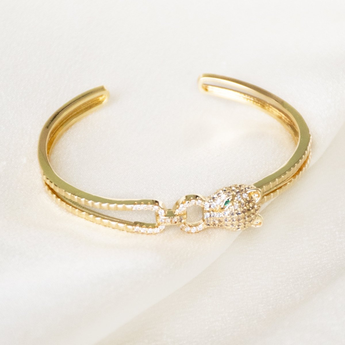 Trendy golden cheetah cuff bangle with a sleek adjustable design and anti-tarnish finish, perfect for everyday styling, statement looks, and effortless modern elegance.