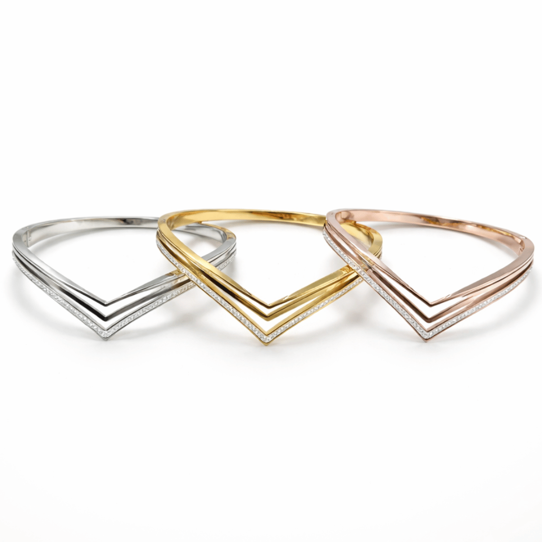 Chevron style V bangle bracelet in gold rose gold and silver with clean lines and minimal sparkle