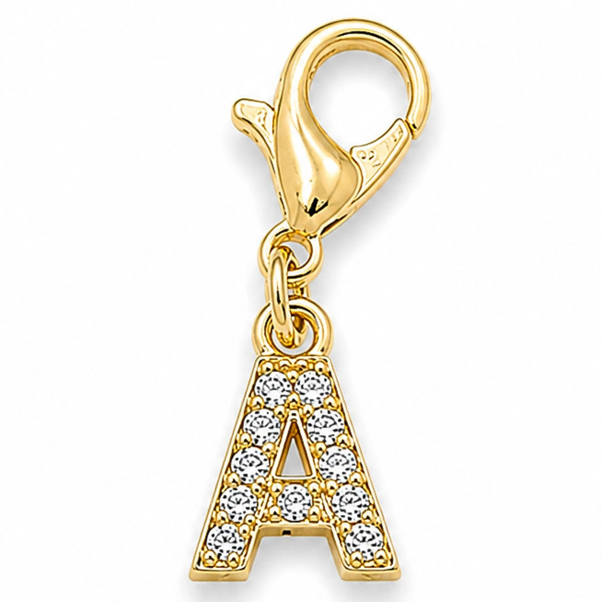 Gold-tone rhinestone-encrusted letter “A” charm with a lobster clasp, displayed on a white background.