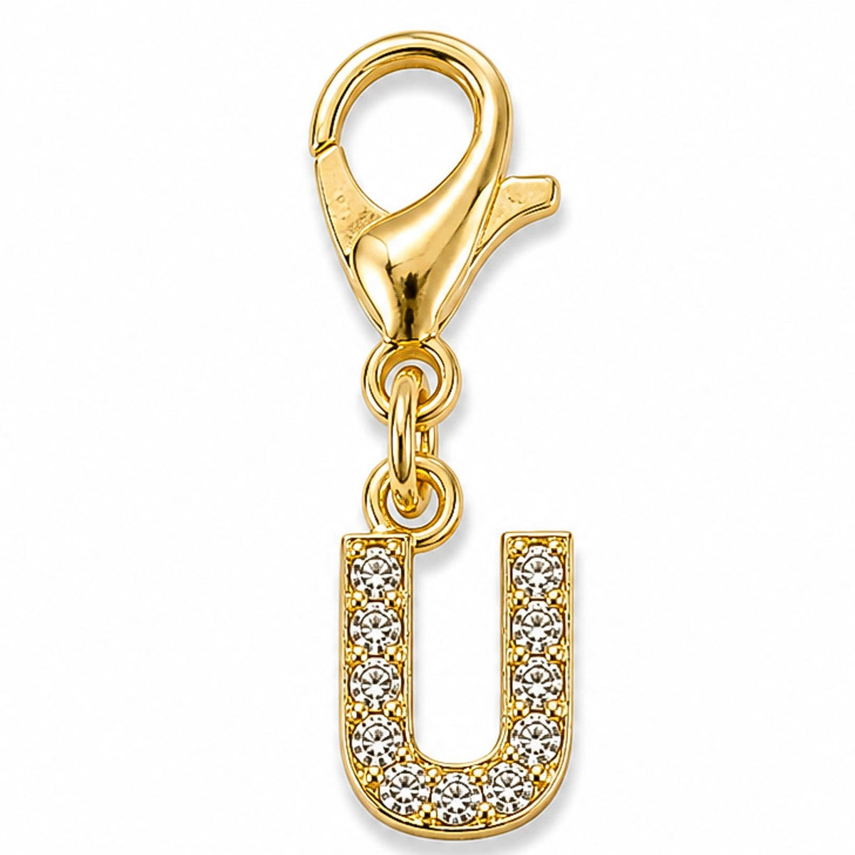 Gold-tone rhinestone-encrusted letter “U” charm with a lobster clasp, displayed on a white background.