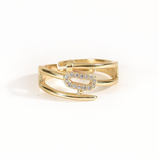 Bold golden nail ring with sparkling oval crystal detailing and an adjustable anti-tarnish finish, perfect for statement styling, parties, and edgy glam looks.