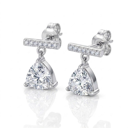 Sterling silver pave bar drop earrings with trillion-cut solitaire stones, worn by a model.