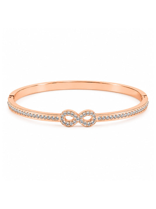 Rose gold-tone bangle featuring a sparkling infinity symbol at the center and rows of clear crystal accents along the band, displayed on a clean white background.
