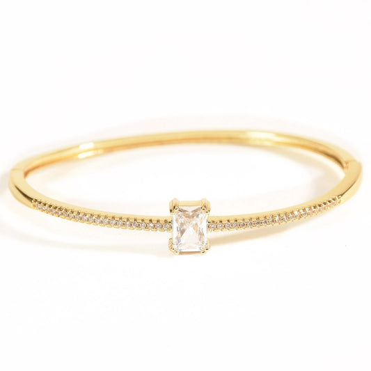 Gold studded princess stone bracelet with a rectangular crystal centerpiece, anti-tarnish jewellery for women on a white background.