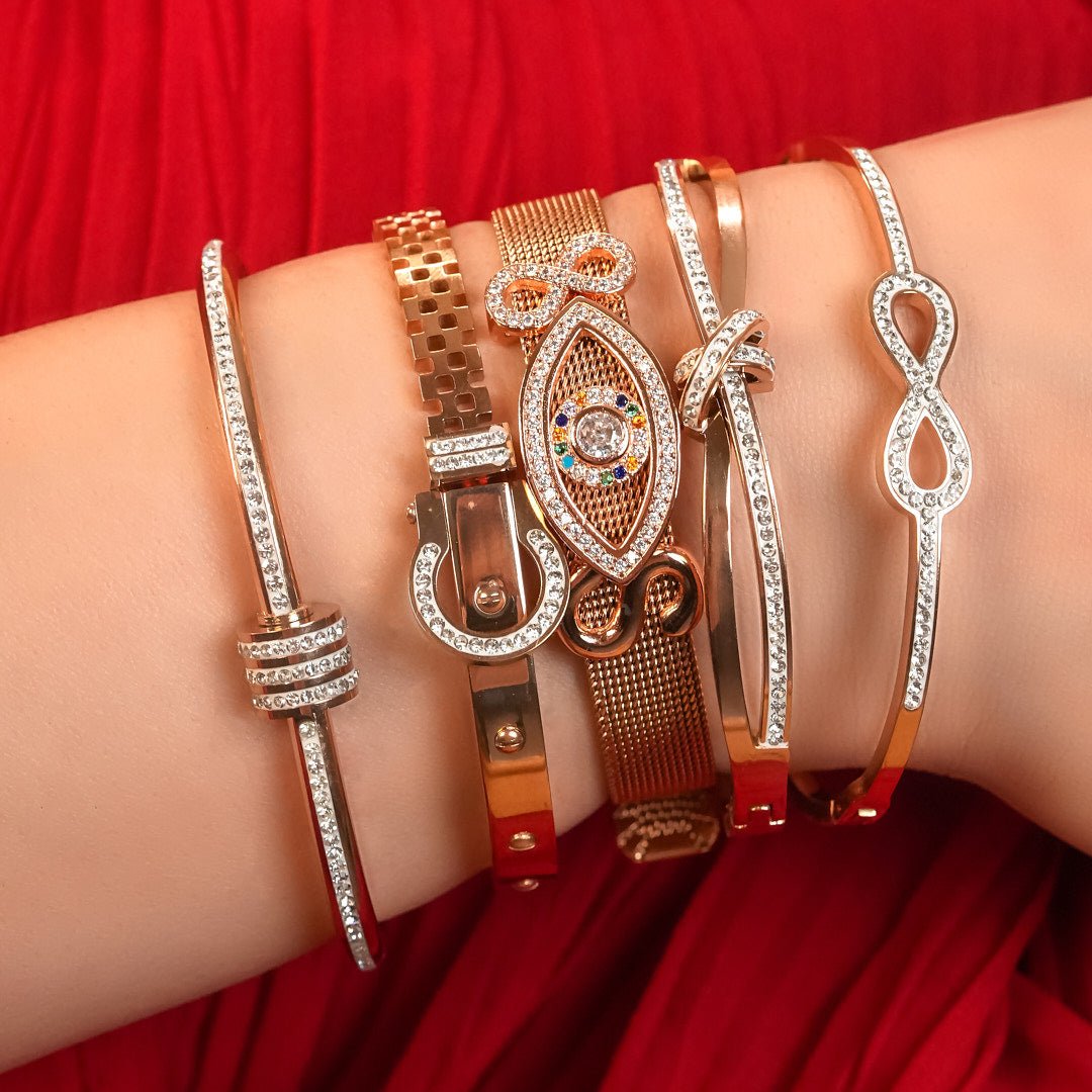 Elegant rosegold twisted sparkle bangle with shimmering stone detailing and an anti-tarnish finish, perfect for everyday glam, casual styling, gifting, and chic layered looks.