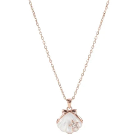 The image shows a delicate rose-gold necklace with a fine chain and a small translucent white, pearl-like pendant. The pendant is wrapped with rose-gold metal detailing and features a tiny sparkling floral/crystal accent, giving it a soft, elegant look against a clean white background.