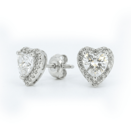 Diamond heart studs with sparkling crystal detailing and an anti-tarnish silver finish, perfect for everyday wear and romantic styling.