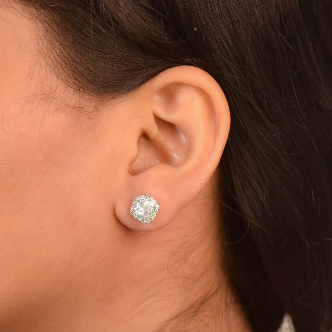 Timeless diamond square studs with sparkling halo crystal detailing and an anti-tarnish silver finish, perfect for everyday wear and elegant styling.