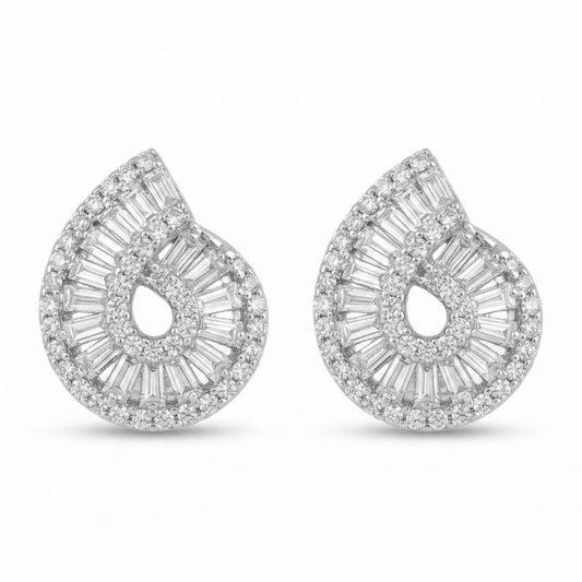 Diamond swirl studs with baguette and round crystal detailing and an anti-tarnish silver finish, perfect for everyday wear and elegant styling.